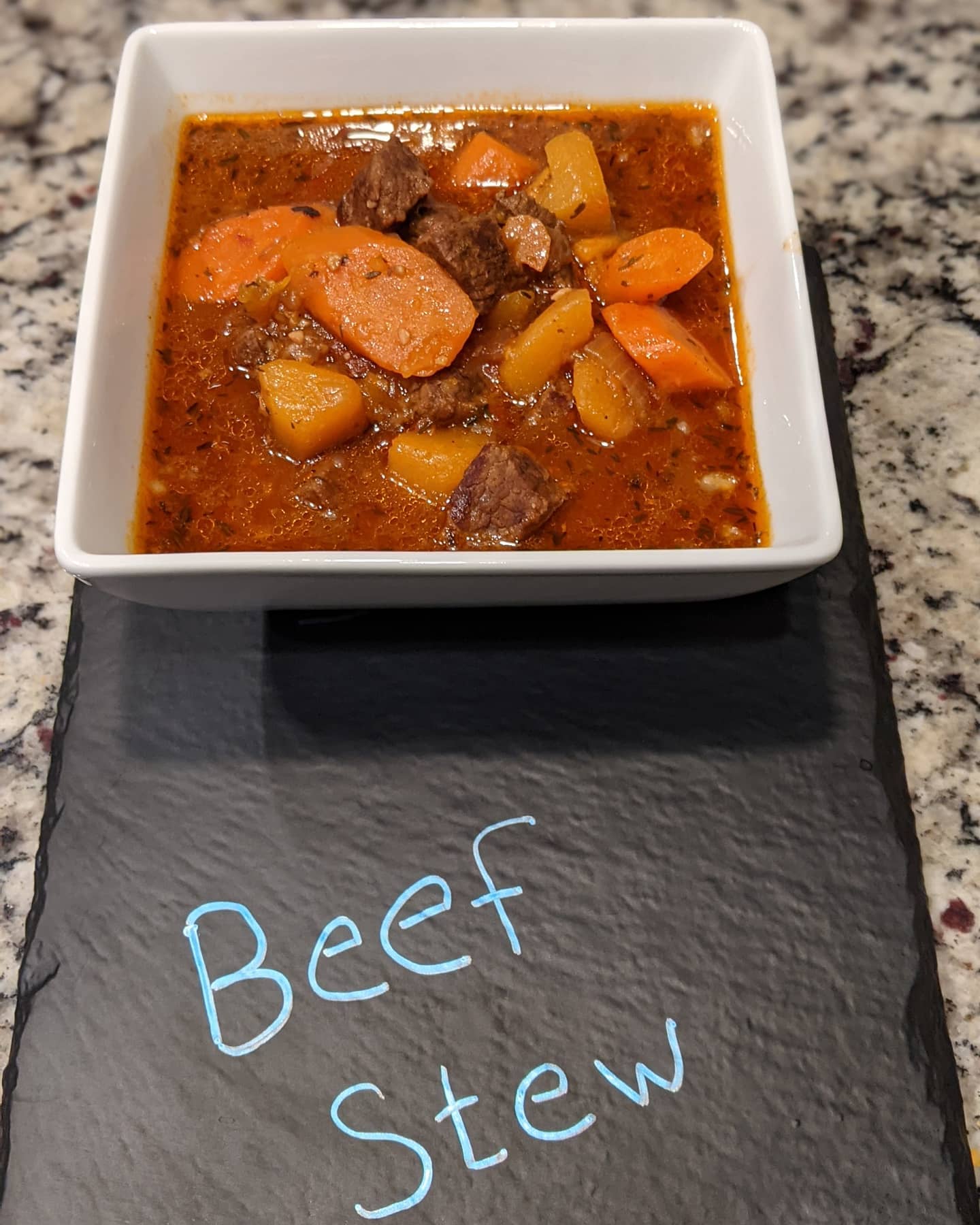 Instant pot beef stew with sweet potato butternut squash and carrots and a nice glass of Rumpus 2019 Cabernet Sauvignon. after having no power for so many days it's nice to actually have a good home cooked meal.